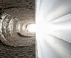 air duct cleaning services showing interior duct system inspection and cleaning in Manchester, NH